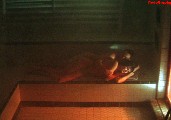 Rebecca Romijn nude in Rollerball