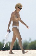 Sharon Stone nude in topless at the beach