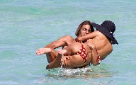 Shauna Sand nude in Topless sunbathing