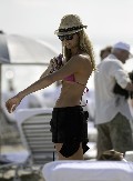 Stacy Keibler in purple bikini