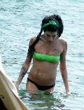 Amy Winehouse in green bikini