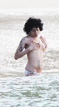 Amy Winehouse nude in Topless swimming