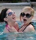 Avril Lavigne in pink bikini