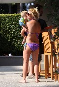Britney Spears in purple bikini