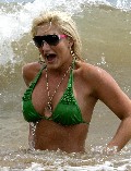 Brooke Hogan in green bikini