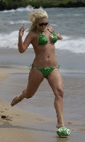Brooke Hogan in green bikini