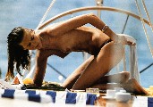 Carmen Kass nude in Topless sunbathing