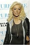 Christina Aguilera in Skin tight grey dress