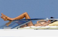 Cindy Crawford nude in topless on a yacht