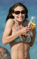 Claire Forlani in bikini at the beach