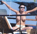 Claudia Pandolfi  nude in Topless sunbathing