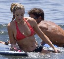 Denise Richards in red bikini