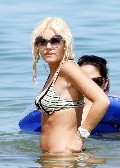 Elisha Cuthbert in bikini at the beach