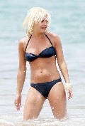 Elisha Cuthbert in bikini at the beach