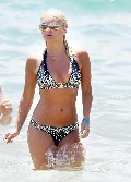 Elisha Cuthbert in bikini at the beach
