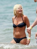 Elisha Cuthbert in bikini at the beach