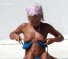 Geri Halliwell nude in Topless sunbathing