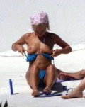 Geri Halliwell nude in Topless sunbathing