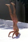 Geri Halliwell nude in Topless sunbathing
