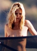 Heidi Klum nude in topless on a yacht