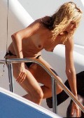 Heidi Klum nude in topless on a yacht