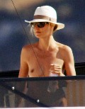 Heidi Klum nude in topless on a yacht