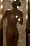 Olga Kurylenko nude in "Magic City"