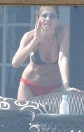 Jennifer Aniston in red black bikini