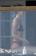 Jennifer Aniston in red black bikini