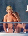 Kate Moss nude in topless at the beach