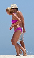 Katherine Heigl in purple bikini