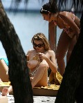 Keeley Hazell nude in topless at the beach