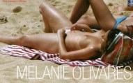 Melanie Olivares nude in Topless sunbathing