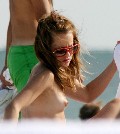 Mena Suvari nude in Topless sunbathing