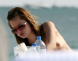 Mena Suvari nude in Topless sunbathing