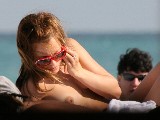 Mena Suvari nude in Topless sunbathing