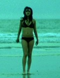 Mila Kunis in Moving McAllister
