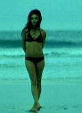 Mila Kunis in Moving McAllister
