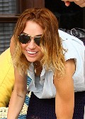 Miley Cyrus nude in nipple slip