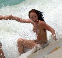 Natasha Hamilton nude in Topless swimming