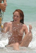 Natasha Hamilton nude in Topless swimming