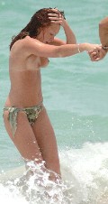 Natasha Hamilton nude in Topless swimming