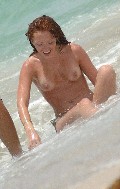 Natasha Hamilton nude in Topless swimming