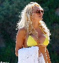 Pamela Anderson nude in yellow bikini