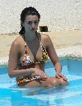 Penélope Cruz in bikini by the pool