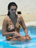 Penélope Cruz in bikini by the pool