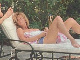 Rachel Hunter nude in Topless sunbathing