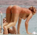 Rachel Hunter nude in Topless swimming