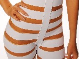 Rihanna in Stripes suit