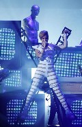 Rihanna in Stripes suit in Concert